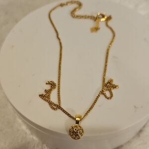 Nina Ricci Gold Pendant Necklace